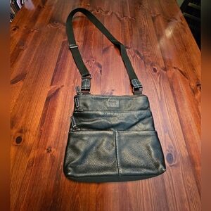 Roots pebble leather cross body bag in excellent condition. Black